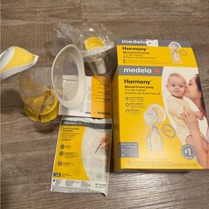 Medela harmony manual breast pump.
